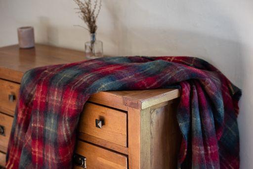 Soft Mohair luxury throws from Glamorous Goat.  Mohair throw in Cadrona red and green check available at My Sanctuary