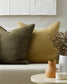 Keaton Linen cushion in wheat with khaki cushion on white sofaa