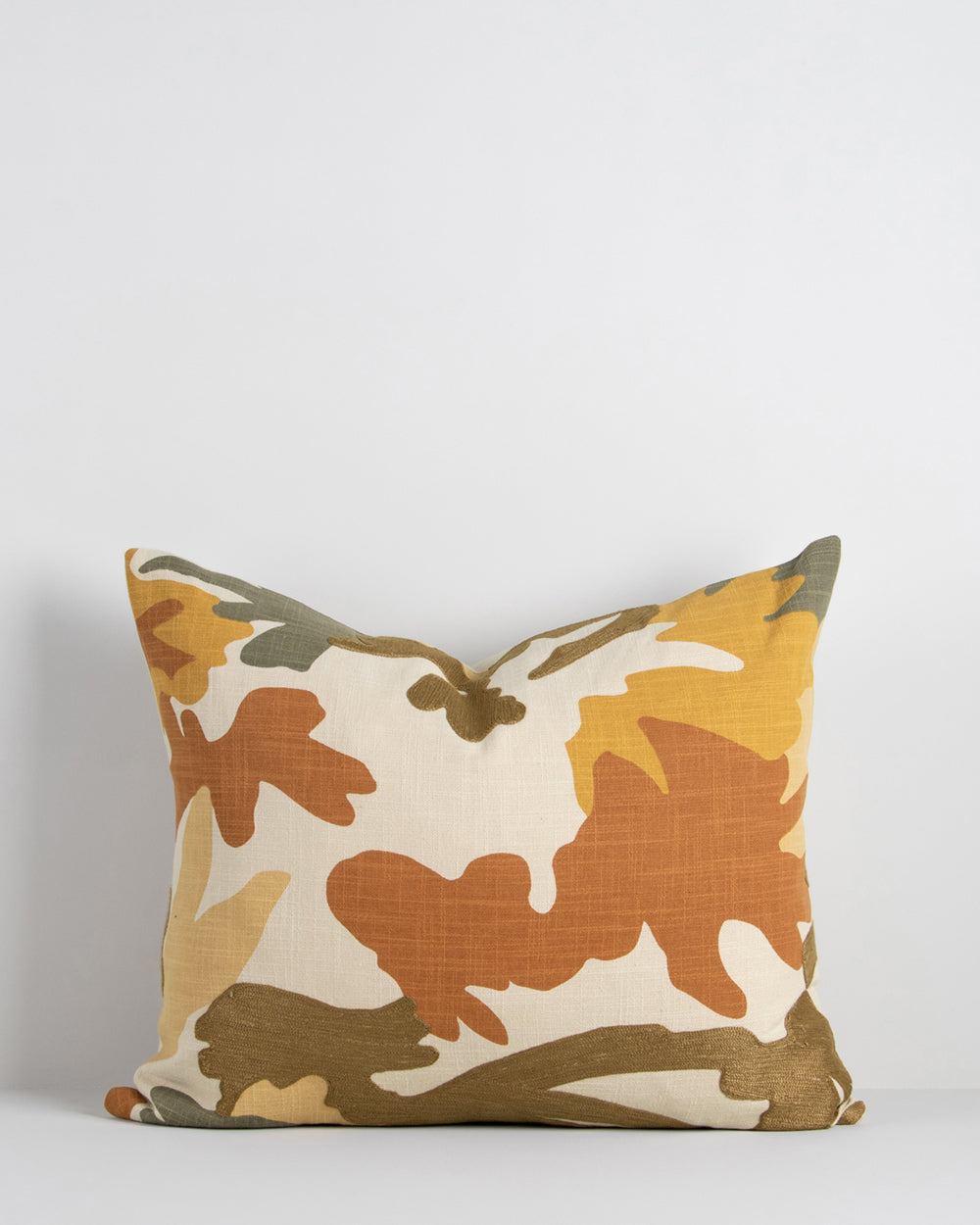 Maschera cotton cushion from the Baya Collection with jungle patterns in mustard, olive, ecru rust