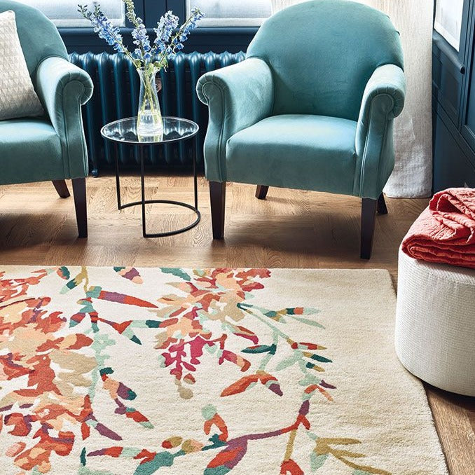 Hana Villa Nova rug in Jewel with blue chairs and radiator